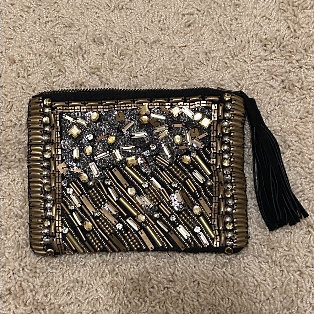 Anthropologie Jasper & Jeera bronze crystal and beaded clutch with tassel